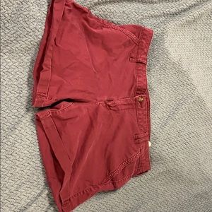 Maroon shorts.